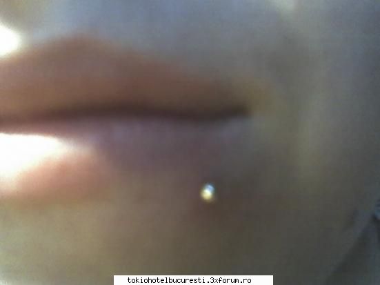 pierceuri - buey io nu mi-am mai dat pierce in buric ca plec - Diverse